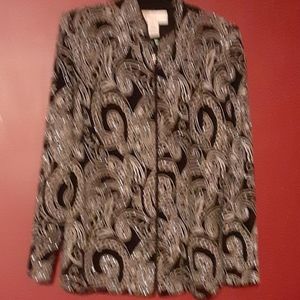 zips up the front sparkley  jacket